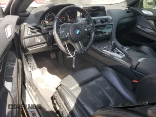 2016 BMW M6 z VIN WBS6J9C51GD934487, wystawiony jako Copart lot #45756775 z przebiegiem 62 179 mil mil oraz Szkoda całkowita • Salvage title. Historia ofert i sprzedaży dostępna na DreamBid. Obrazek 8.