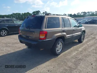 2001 Jeep Grand Cherokee Laredo with VIN 1J4GX48S91C559693, listed as a IAAI auction lot 42152103 with 152,713 mi miles and . Bid and sale history available at DreamBid. Image 4.