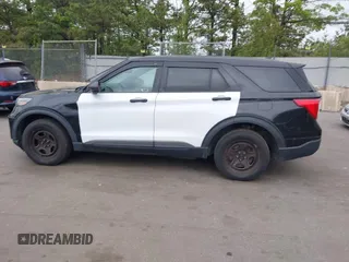 2021 Ford Police Interceptor Utility z VIN 1FM5K8AB7MGA43175, wystawiony jako IAAI lot #42322326 z przebiegiem Nie podano mil oraz . Historia ofert i sprzedaży dostępna na DreamBid. Obrazek 14.