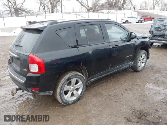 2015 Jeep Compass High Altitude Edition with VIN 1C4NJDEB9FD396502, listed as a IAAI auction lot 41757194 with 157,928 mi miles. Bid and sale history available at carsss.com. Image 4.