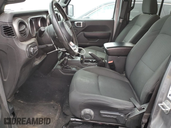 2020 Jeep Gladiator Sport S z VIN 1C6HJTAG2LL120101, wystawiony jako Copart lot #47842005 z przebiegiem 59 988 mil mil oraz Szkoda całkowita • Salvage title. Historia ofert i sprzedaży dostępna na DreamBid. Obrazek 7.