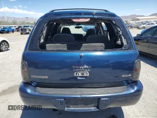 2000 Dodge Durango z VIN 1B4HS28N0YF269677, wystawiony jako Copart lot #54956785 z przebiegiem Nie podano mil oraz Szkoda całkowita • Salvage title. Historia ofert i sprzedaży dostępna na DreamBid. Obrazek 6.