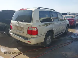 2000 Lexus LX 470 with VIN JT6HT00W5Y0080249, listed as a IAAI auction lot 41726247 with 315,707 mi miles and . Bid and sale history available at carsss.com. Image 4.