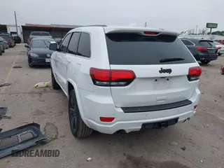 2015 Jeep Grand Cherokee Altitude with VIN 1C4RJEAG2FC901391, listed as a IAAI auction lot 41565763 with 220,685 mi miles. Bid and sale history available at carsss.com. Image 3.