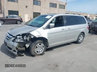 2006 Honda Odyssey EX-L z VIN 5FNRL38736B089963, wystawiony jako IAAI lot #41858061 z przebiegiem 178 845 mil mil oraz . Historia ofert i sprzedaży dostępna na DreamBid. Obrazek 17.