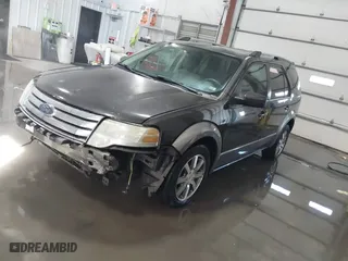 2008 Ford Taurus X SEL with VIN 1FMDK02W98GA15575, listed as a IAAI auction lot 41328842 with 245,307 mi miles. Bid and sale history available at carsss.com. Image 2.
