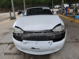 2004 Mazda MX-5 Miata LS z VIN JM1NB353640407864, wystawiony jako Copart lot #53951315 z przebiegiem 116 295 mil mil oraz Szkoda całkowita • Salvage title. Historia ofert i sprzedaży dostępna na DreamBid. Obrazek 5.