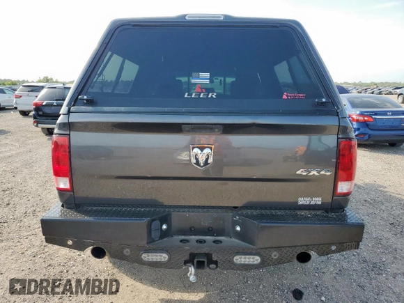 2016 Ram 1500 Tradesman z VIN 3C6RR7KT1GG376846, wystawiony jako Copart lot #57283185 z przebiegiem 214 594 mil mil oraz Szkoda całkowita • Salvage title. Historia ofert i sprzedaży dostępna na DreamBid. Obrazek 6.