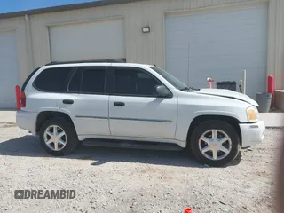 2007 GMC Envoy SLE with VIN 1GKDT13S472223365, listed as a IAAI auction lot 41690531 with 170,539 mi miles. Bid and sale history available at carsss.com. Image 13.