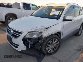 2010 Volkswagen Tiguan SEL with VIN WVGBV7AX4AW514362, listed as a IAAI auction lot 41413300 with 154,201 mi miles and . Bid and sale history available at DreamBid. Image 6.