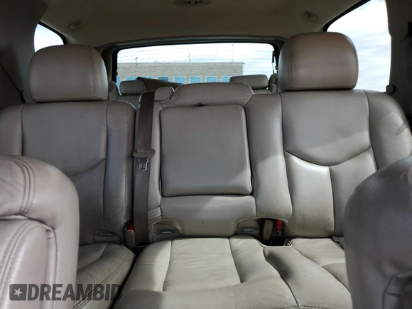 2003 GMC Yukon SLT with VIN 1GKEK13ZX3J302995, listed as a Copart auction lot 49966704 with 211,777 mi miles and Salvage Title. Bid and sale history available at carsss.com. Image 10.