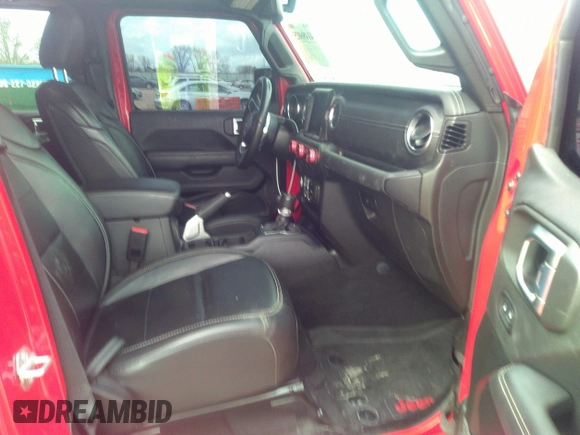 2022 Jeep Wrangler Unlimited Sahara with VIN 1C4JJXP62NW136932, listed as a IAAI auction lot 41486025 with 36,986 mi miles and . Bid and sale history available at DreamBid. Image 5.