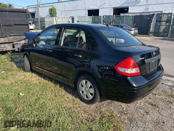 2010 Nissan Versa 1.6 with VIN 3N1CC1AP5AL391286, listed as a IAAI auction lot 42005172 with 33,441 mi miles. Bid and sale history available at carsss.com. Image 3.