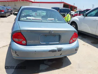 2001 Nissan Maxima GXE with VIN JN1CA31D51T604935, listed as a IAAI auction lot 42504918 with 253,407 mi miles and . Bid and sale history available at DreamBid. Image 6.