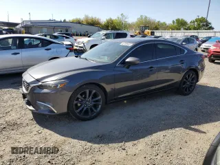 2016 Mazda 6 i Grand Touring with VIN JM1GJ1W54G1445902, listed as a Copart auction lot 52738945 with 139,859 mi miles and Salvage Title. Bid and sale history available at DreamBid. Image 1.