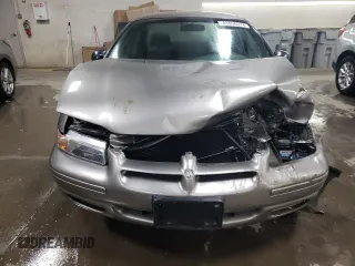 1999 Dodge Stratus z VIN 1B3EJ46X0XN690121, wystawiony jako Copart lot #83056374 z przebiegiem Nie podano mil oraz Szkoda całkowita • Salvage title. Historia ofert i sprzedaży dostępna na DreamBid. Obrazek 5.
