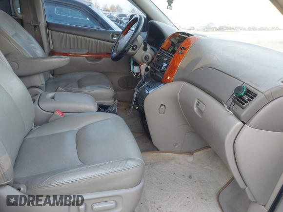 2007 Toyota Sienna XLE with VIN 5TDZK22C97S062721, listed as a IAAI auction lot 41900786 with 220,189 mi miles. Bid and sale history available at carsss.com. Image 5.