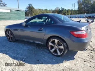 2012 Mercedes-Benz SLK-Class SLK 350 with VIN WDDPK5HA6CF030999, listed as a Copart auction lot 80748424 with 100,496 mi miles and Salvage Title. Bid and sale history available at carsss.com. Image 2.