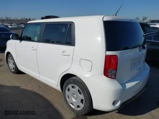 2014 Scion xB with VIN JTLZE4FE0EJ048932, listed as a IAAI auction lot 41992285 with 129,567 mi miles. Bid and sale history available at carsss.com. Image 3.