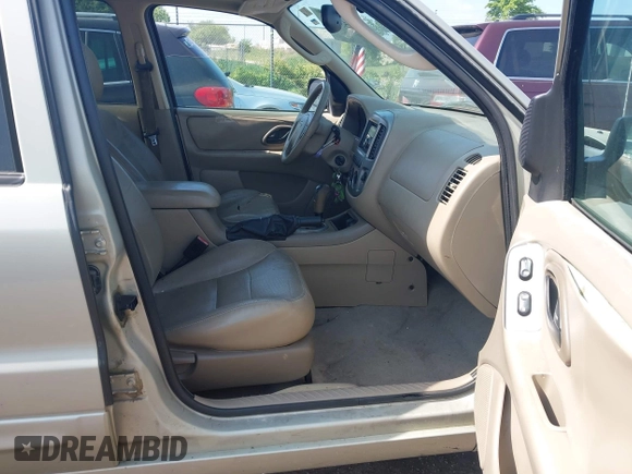 2005 Ford Escape Limited with VIN 1FMYU94175KA06769, listed as a IAAI auction lot 42532103 with 129,905 mi miles and . Bid and sale history available at DreamBid. Image 5.