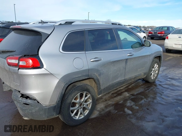 2014 Jeep Cherokee Latitude with VIN 1C4PJMCS9EW122196, listed as a IAAI auction lot 41649757 with 205,363 mi miles and . Bid and sale history available at DreamBid. Image 4.