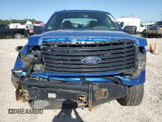 2014 Ford F-150 XL with VIN 1FTFX1EF0EFB59517, listed as a Copart auction lot 52318065 with 203,181 mi miles and Clean title. Bid and sale history available at DreamBid. Image 5.
