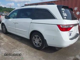 2011 Honda Odyssey EX-L with VIN 5FNRL5H60BB026171, listed as a IAAI auction lot 42511296 with 288,827 mi miles and . Bid and sale history available at DreamBid. Image 3.