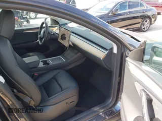 2024 Tesla Model Y Long Range z VIN 7SAYGDEE0RA263842, wystawiony jako IAAI lot #42106339 z przebiegiem 48 447 mil mil oraz . Historia ofert i sprzedaży dostępna na DreamBid. Obrazek 5.