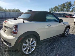 2015 MINI Roadster S z VIN WMWSY3C56FT595466, wystawiony jako Copart lot #69655944 z przebiegiem 53 971 mil mil oraz Szkody całkowita. Historia ofert i sprzedaży dostępna na DreamBid. Obrazek 3.