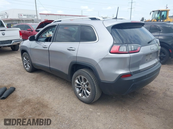 2021 Jeep Cherokee Altitude with VIN 1C4PJLLB2MD164004, listed as a IAAI auction lot 42083946 with 99,136 mi miles and . Bid and sale history available at DreamBid. Image 3.