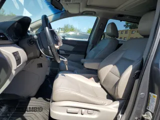 2011 Honda Odyssey Touring with VIN 5FNRL5H97BB501213, listed as a Copart auction lot 57314115 with 283,538 mi miles and Salvage title. Bid and sale history available at DreamBid. Image 7.