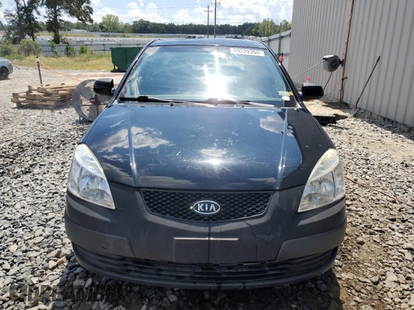 2009 Kia Rio LX with VIN KNADE223296539006, listed as a Copart auction lot 69229394 with 227,766 mi miles and Salvage Title. Bid and sale history available at DreamBid. Image 5.