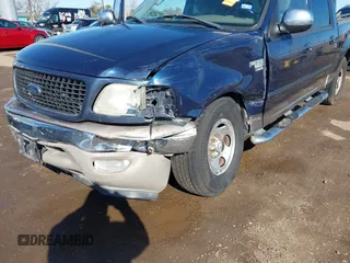 2002 Ford F-150 XLT with VIN 1FTRW07692KC25069, listed as a IAAI auction lot 41387047 with 208,811 mi miles. Bid and sale history available at carsss.com. Image 6.