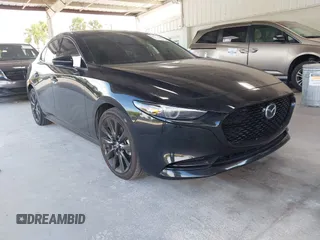 2022 Mazda 3 2.5 Turbo z VIN 3MZBPBAY0NM300949, wystawiony jako IAAI lot #42657368 z przebiegiem 37 935 mil mil oraz . Historia ofert i sprzedaży dostępna na DreamBid. Obrazek 1.