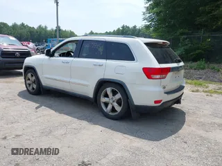 2011 Jeep Grand Cherokee Overland with VIN 1J4RR6GG3BC587857, listed as a IAAI auction lot 42879845 with 165,572 mi miles and . Bid and sale history available at DreamBid. Image 3.