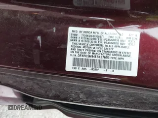 2014 Honda Odyssey Touring with VIN 5FNRL5H94EB127695, listed as a IAAI auction lot 41936109 with 221,786 mi miles and . Bid and sale history available at DreamBid. Image 9.