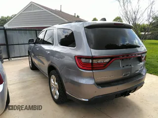 2015 Dodge Durango Limited with VIN 1C4RDJDGXFC810526, listed as a IAAI auction lot 42717037 with 158,160 mi miles and . Bid and sale history available at DreamBid. Image 3.