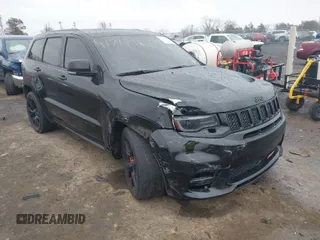 2018 Jeep Grand Cherokee SRT z VIN 1C4RJFDJ2JC391503, wystawiony jako IAAI lot #41717243 z przebiegiem 78 157 mil mil oraz . Historia ofert i sprzedaży dostępna na DreamBid. Obrazek 1.