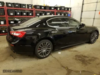 2016 Maserati Ghibli S Q4 with VIN ZAM57RTA3G1171304, listed as a Copart auction lot 69976983 with 97,099 mi miles. Bid and sale history available at carsss.com. Image 3.