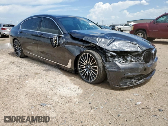 2016 BMW 7 Series 740i with VIN WBA7E2C57GG714564, listed as a Copart auction lot 64005965 with 111,598 mi miles and Salvage title. Bid and sale history available at DreamBid. Image 4.