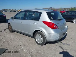 2009 Nissan Versa 1.8 SL with VIN 3N1BC13E09L393563, listed as a IAAI auction lot 41977998 with 163,072 mi miles. Bid and sale history available at carsss.com. Image 3.