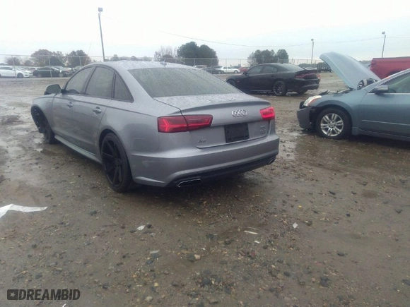 2016 Audi A6 3.0T Premium Plus with VIN WAUFGAFC6GN177739, listed as a IAAI auction lot 41013262 with 89,865 mi miles. Bid and sale history available at carsss.com. Image 3.
