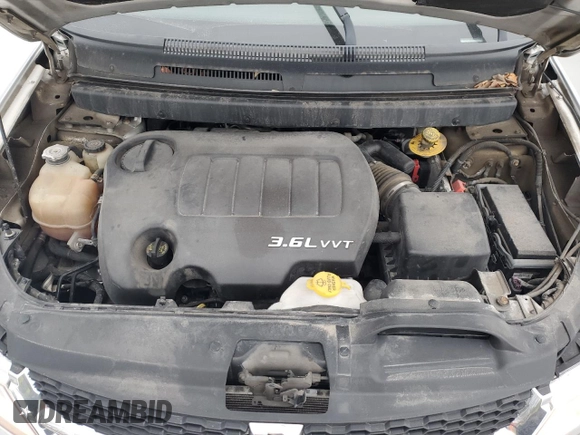 2013 Dodge Journey Crew with VIN 3C4PDCCG4DT698618, listed as a Copart auction lot 87632875 with 198,284 mi miles and Salvage title. Bid and sale history available at DreamBid. Image 12.