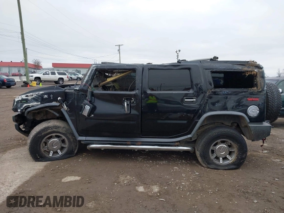 2007 Hummer H2 SUV z VIN 5GRGN23UX7H111093, wystawiony jako IAAI lot #41262675 z przebiegiem Nie podano mil oraz . Historia ofert i sprzedaży dostępna na DreamBid. Obrazek 15.