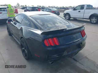 2015 Ford Mustang EcoBoost with VIN 1FA6P8TH3F5418205, listed as a IAAI auction lot 42552784 with 124,782 mi miles and . Bid and sale history available at DreamBid. Image 3.