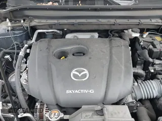 2021 Mazda CX-5 Touring with VIN JM3KFBCM1M1336457, listed as a IAAI auction lot 42034330 with 39,910 mi miles. Bid and sale history available at carsss.com. Image 10.