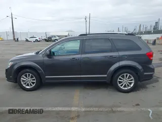 2017 Dodge Journey SXT with VIN 3C4PDCBG3HT618930, listed as a IAAI auction lot 41956400 with 106,185 mi miles and . Bid and sale history available at carsss.com. Image 13.