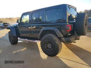 2022 Jeep Wrangler Unlimited High Tide with VIN 1C4HJXDG0NW247152, listed as a Copart auction lot 82371674 with 32,417 mi miles and Salvage Title. Bid and sale history available at DreamBid. Image 2.