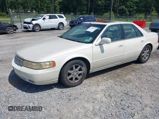 2000 Cadillac Seville Touring STS z VIN 1G6KY5495YU145937, wystawiony jako IAAI lot #42330143 z przebiegiem 217 894 mil mil oraz . Historia ofert i sprzedaży dostępna na DreamBid. Obrazek 2.