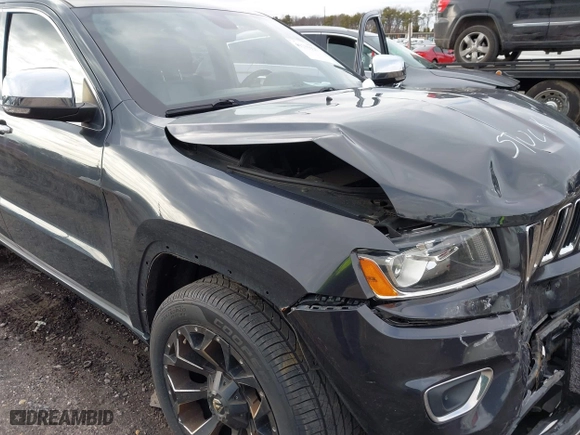 2014 Jeep Grand Cherokee Limited with VIN 1C4RJFBT7EC258715, listed as a IAAI auction lot 41735925 with 103,215 mi miles. Bid and sale history available at carsss.com. Image 17.